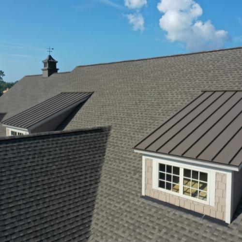 2-story house with shingle roofing system